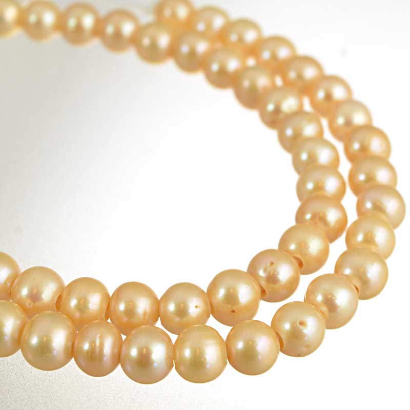 s64198 Freshwater Pearls - 8.5mm Near Round - Big Hole - Champagne Pearl (strand)